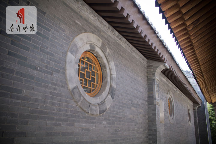 唐语砖雕圆形窗套
